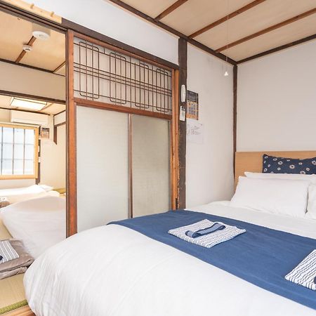 Guesthouse Oneworld Shijo四条京町屋 كيوتو المظهر الخارجي الصورة