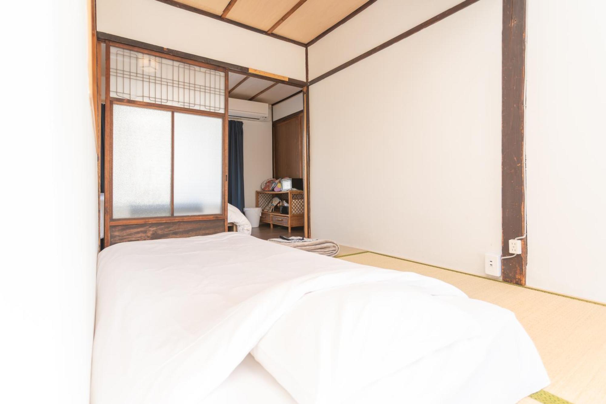 Guesthouse Oneworld Shijo四条京町屋 كيوتو المظهر الخارجي الصورة
