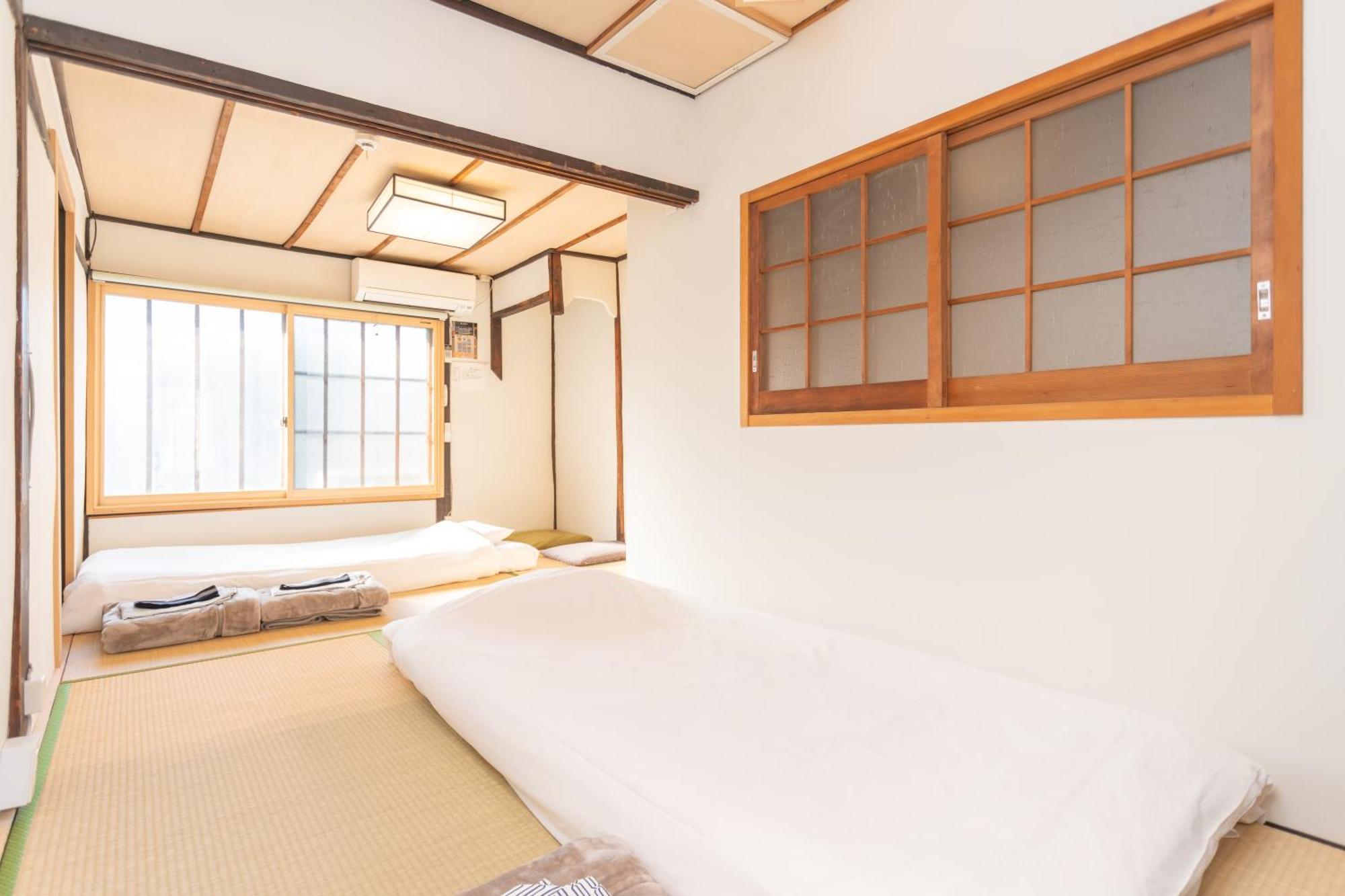 Guesthouse Oneworld Shijo四条京町屋 كيوتو المظهر الخارجي الصورة