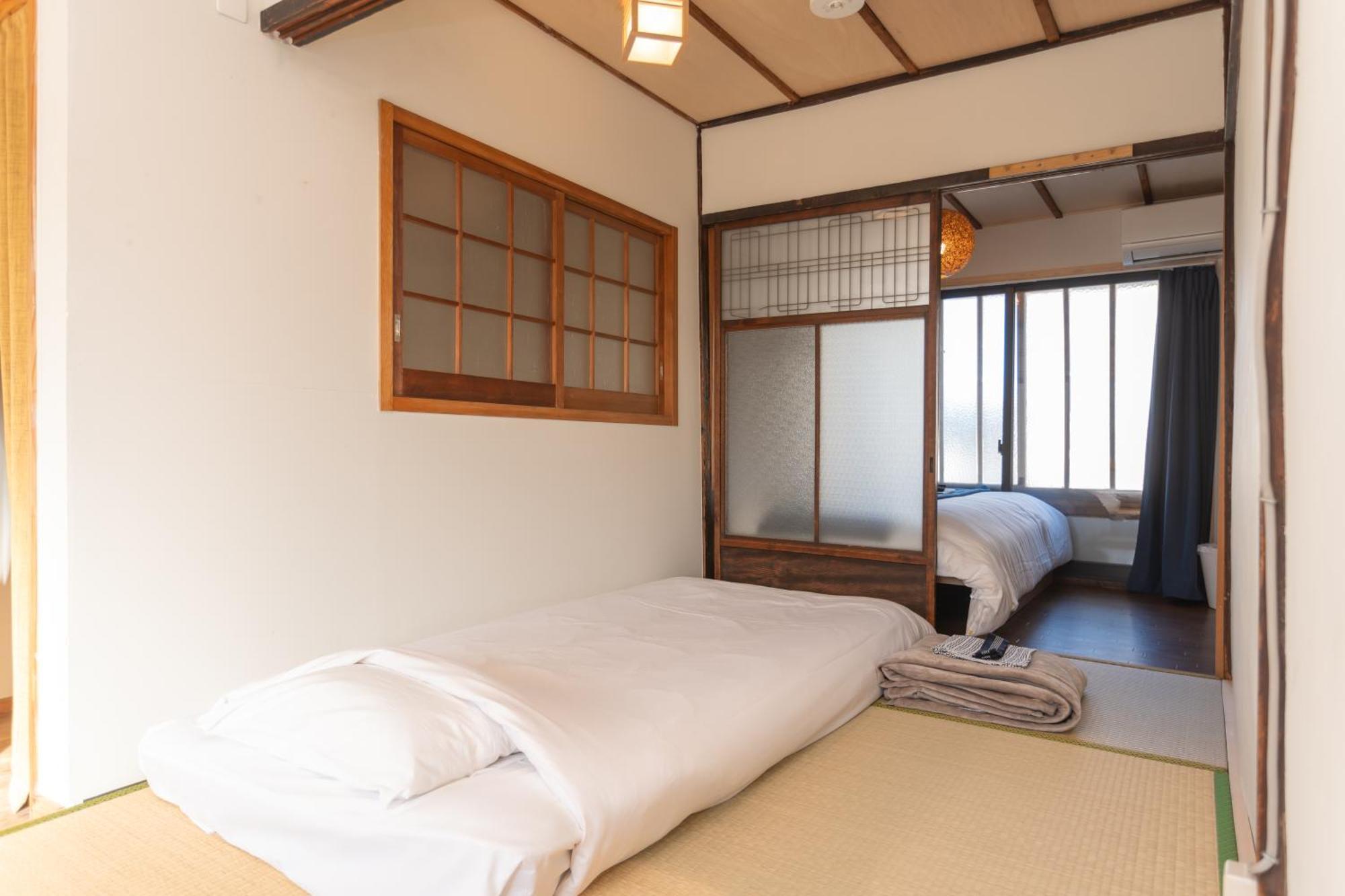 Guesthouse Oneworld Shijo四条京町屋 كيوتو المظهر الخارجي الصورة